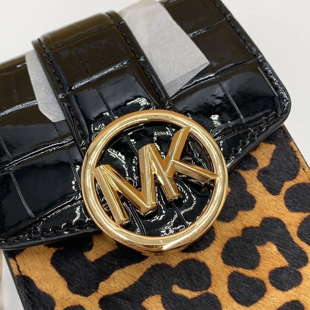 Brand New with Tag
Michael Kors Carmen Small NS Phone XBODY HairCalf
Black Multi - Picture 12 of 16